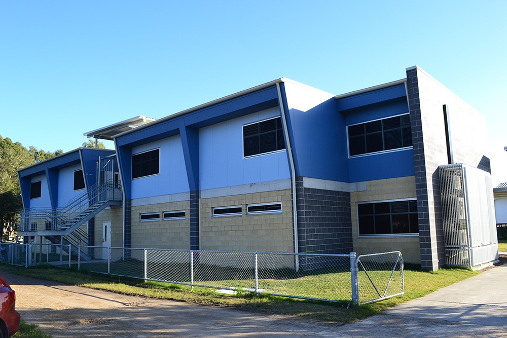 New two level education building with large windows at Belmont State School.