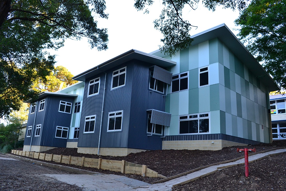Two level education building with large windows at Holland Park State School.